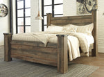Trinell Brown Wood King Poster Bed