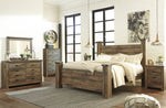 Trinell Brown Wood King Poster Bed