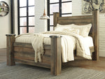 Trinell Brown Wood Queen Poster Bed