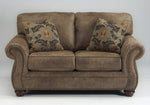 Larkinhurst Earth Faux Leather Loveseat