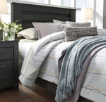 Brinxton Black Wood King Panel Bed