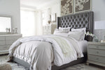 Coralayne Gray Faux Leather Queen Bed