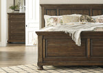 Flynnter Medium Brown King Panel Bed