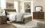 Flynnter Medium Brown King Storage Bed