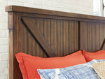 Lakeleigh Brown Wood King Panel Bed with Bench Footboard