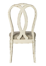 Realyn 2 Chipped White Wood/Neutral Fabric Side Chairs