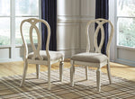 Realyn 2 Chipped White Wood/Neutral Fabric Side Chairs