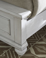 Kanwyn Whitewash Wood/Fabric King Panel Bed